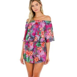 Show Me Your MuMu Off-Shoulder Tropical Floral Romper in Fuchsia